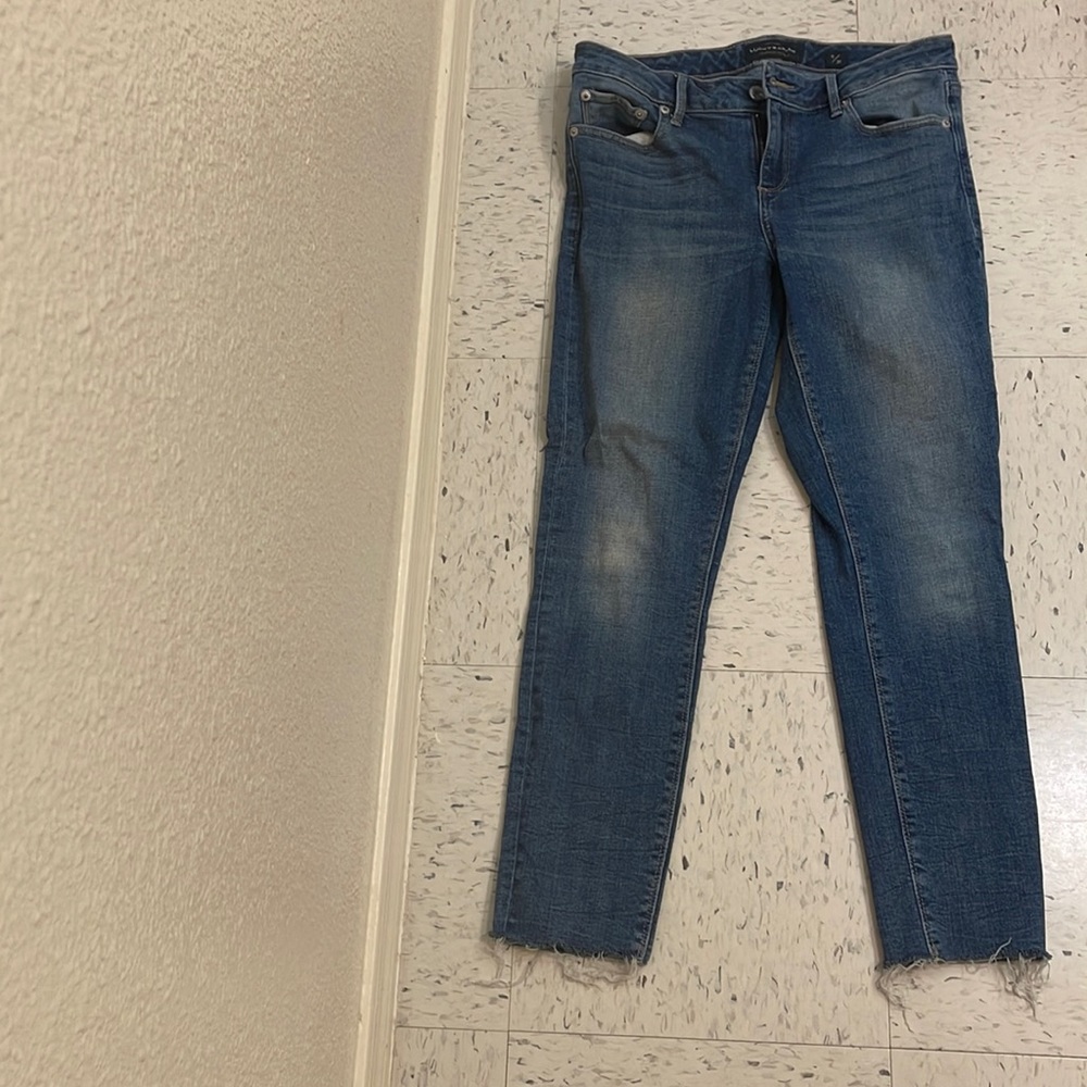 Like New! They are stretchy! I’m 5’5 and they come right to the ankle